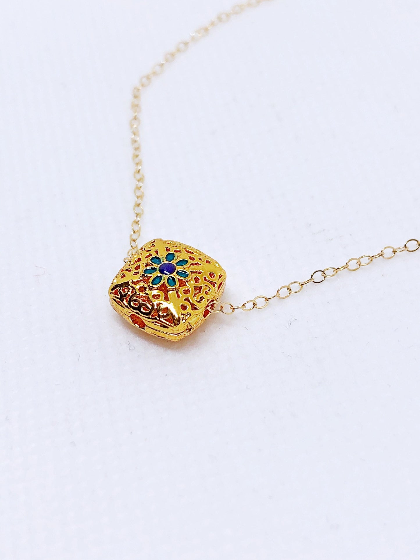 Enamel charm necklace in gold