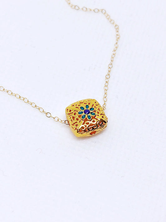 Enamel charm necklace in gold