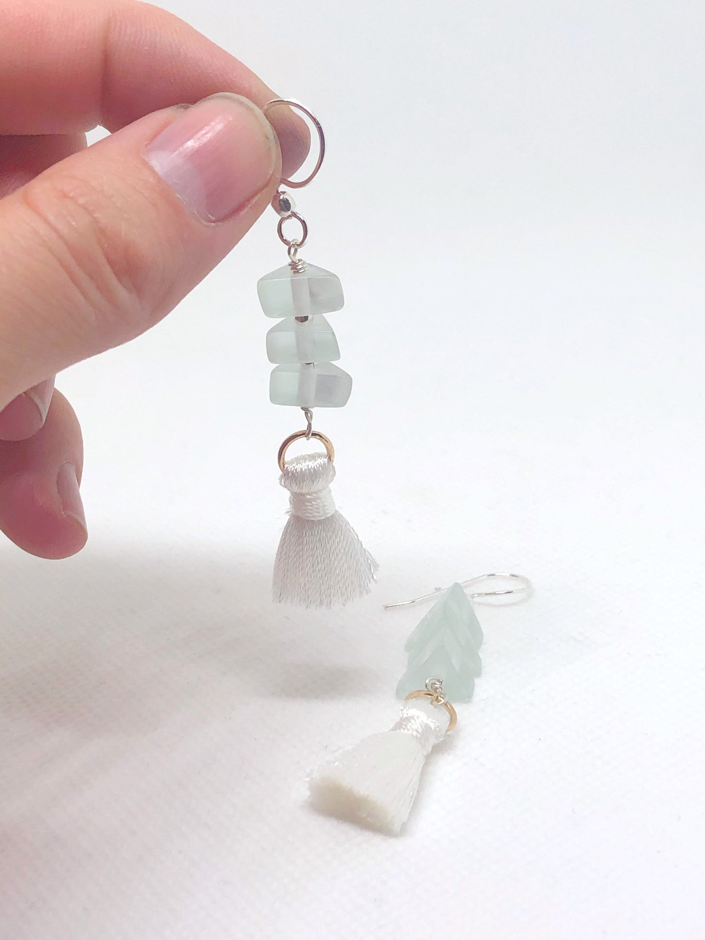 Resin earrings with white tassel