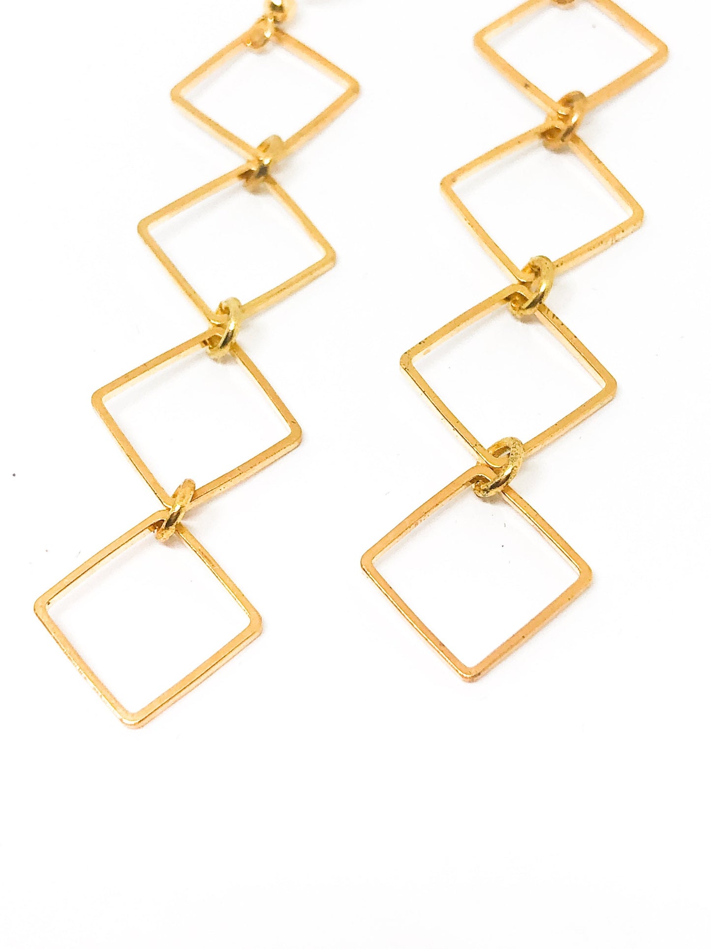 Gold diamond geometric earrings
