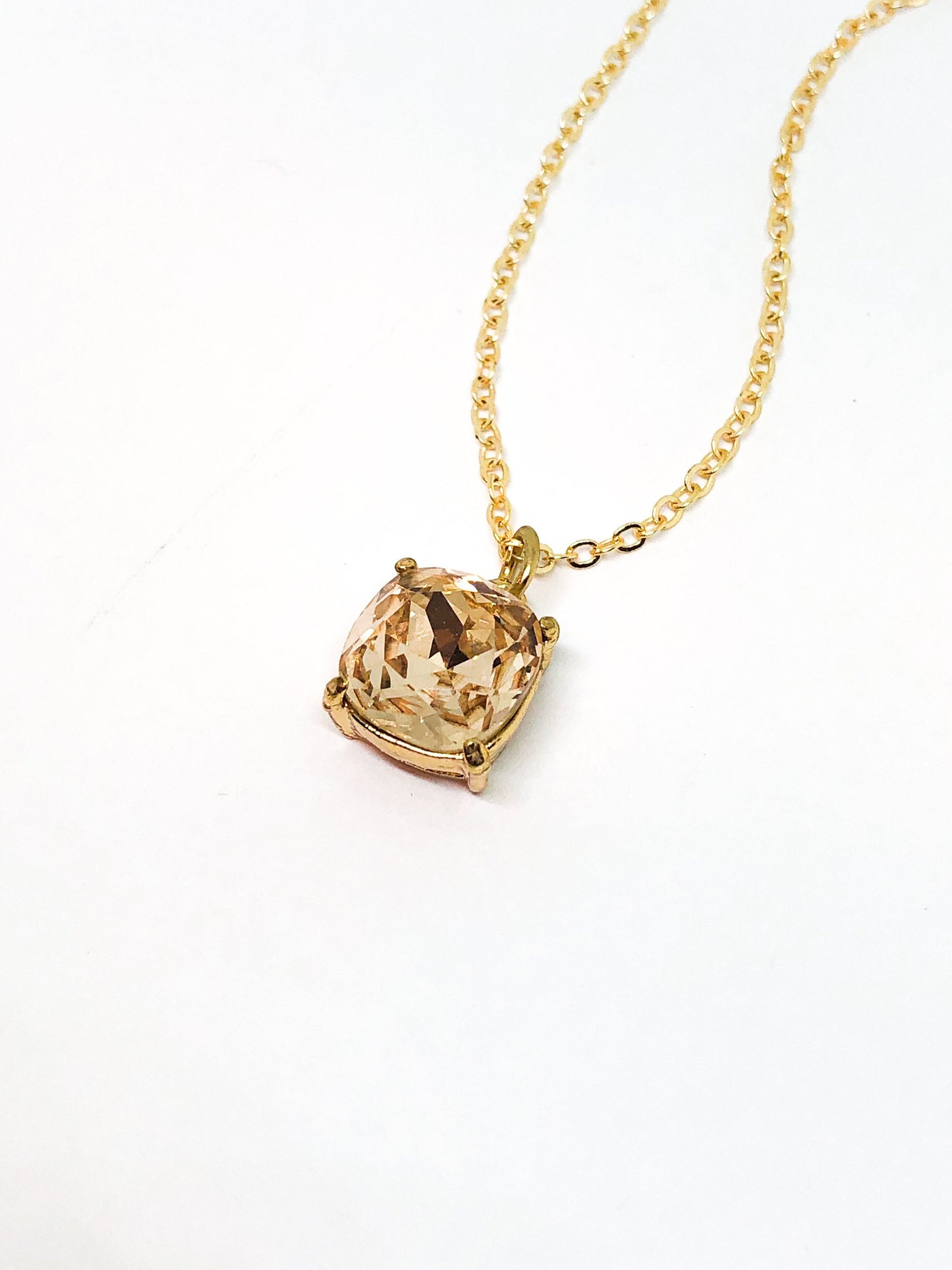 Cream rhinestone pendant necklace