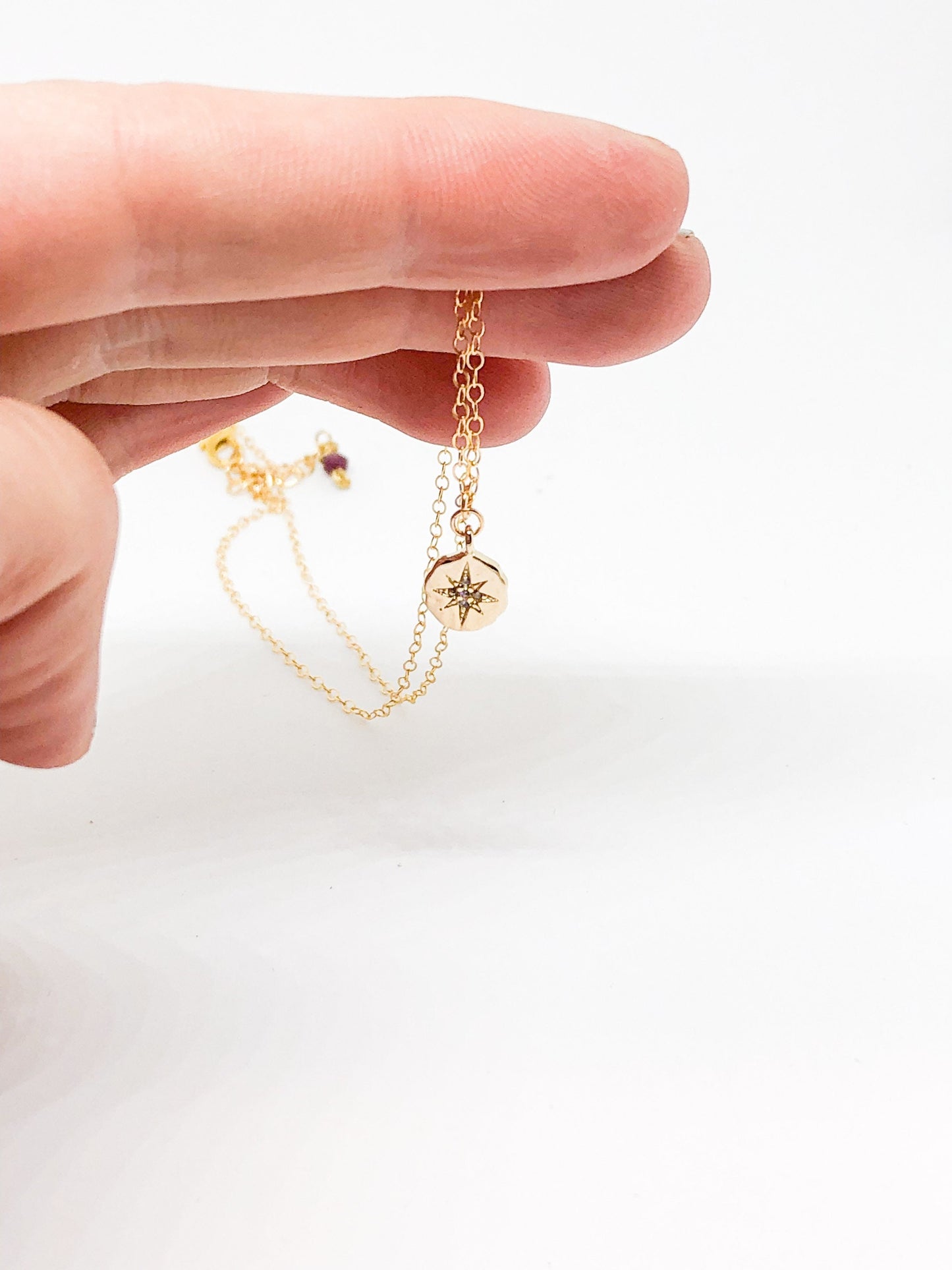 Gold starburst necklace