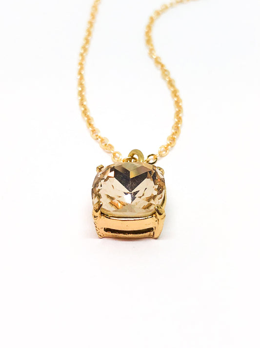 Cream rhinestone pendant necklace