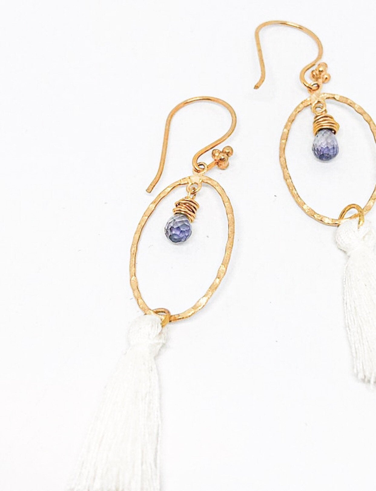 Purple iolite earrings gold with white tassel
