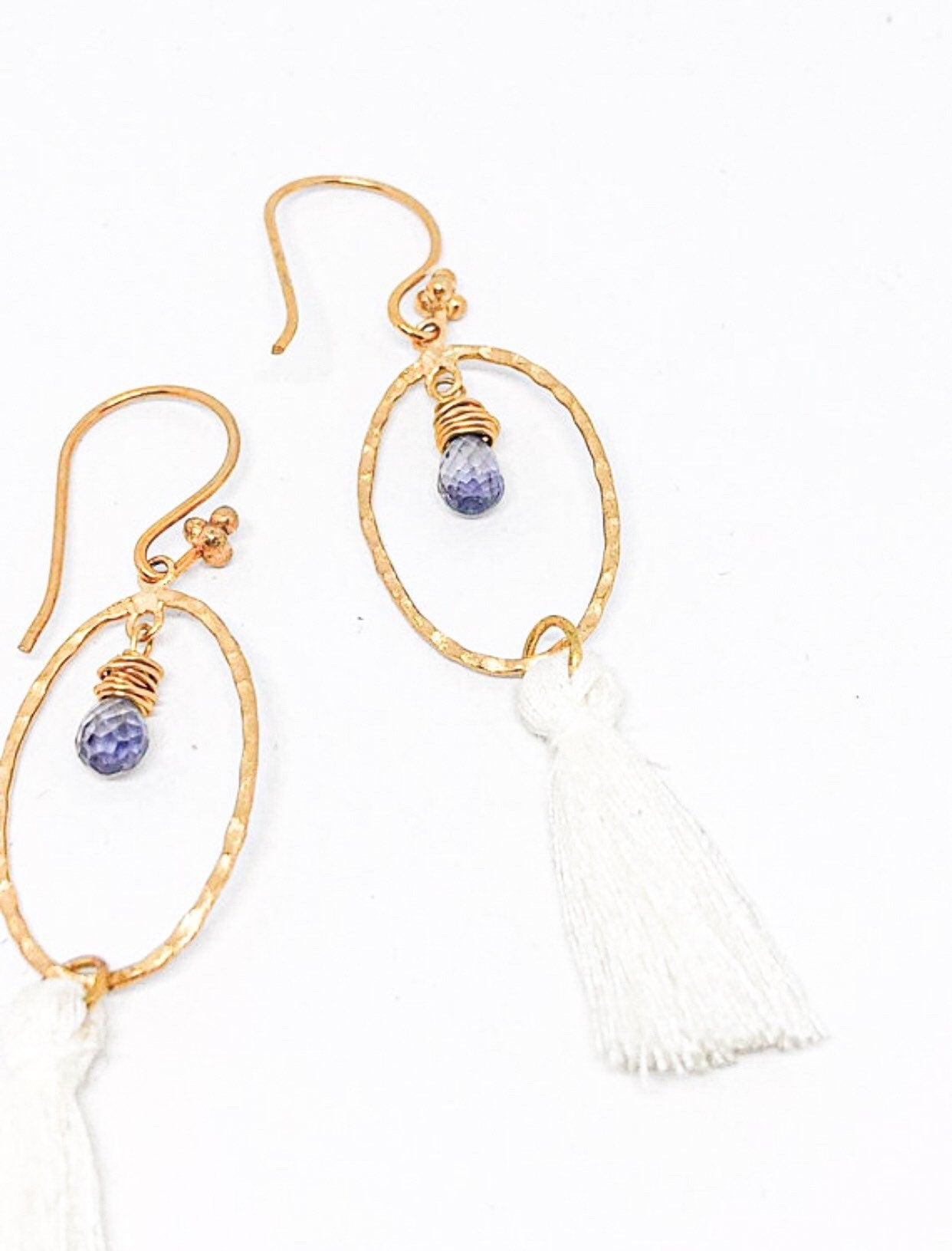 Purple iolite earrings gold with white tassel