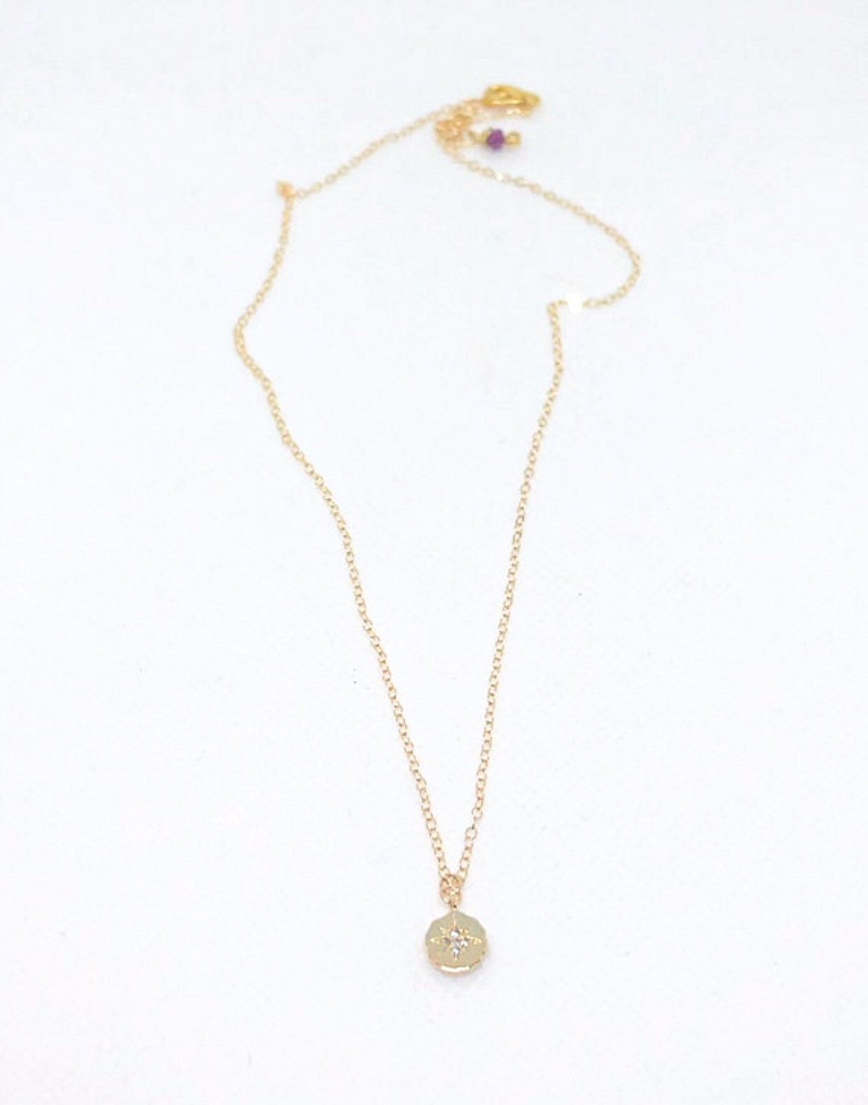 Gold starburst necklace