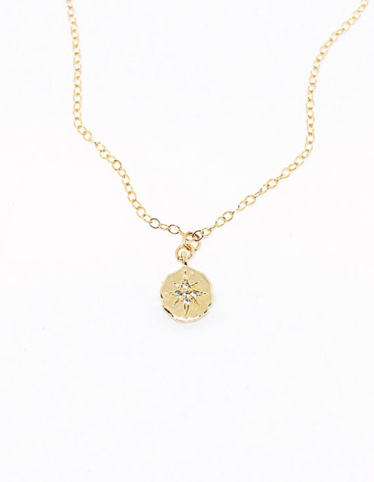 Gold starburst necklace