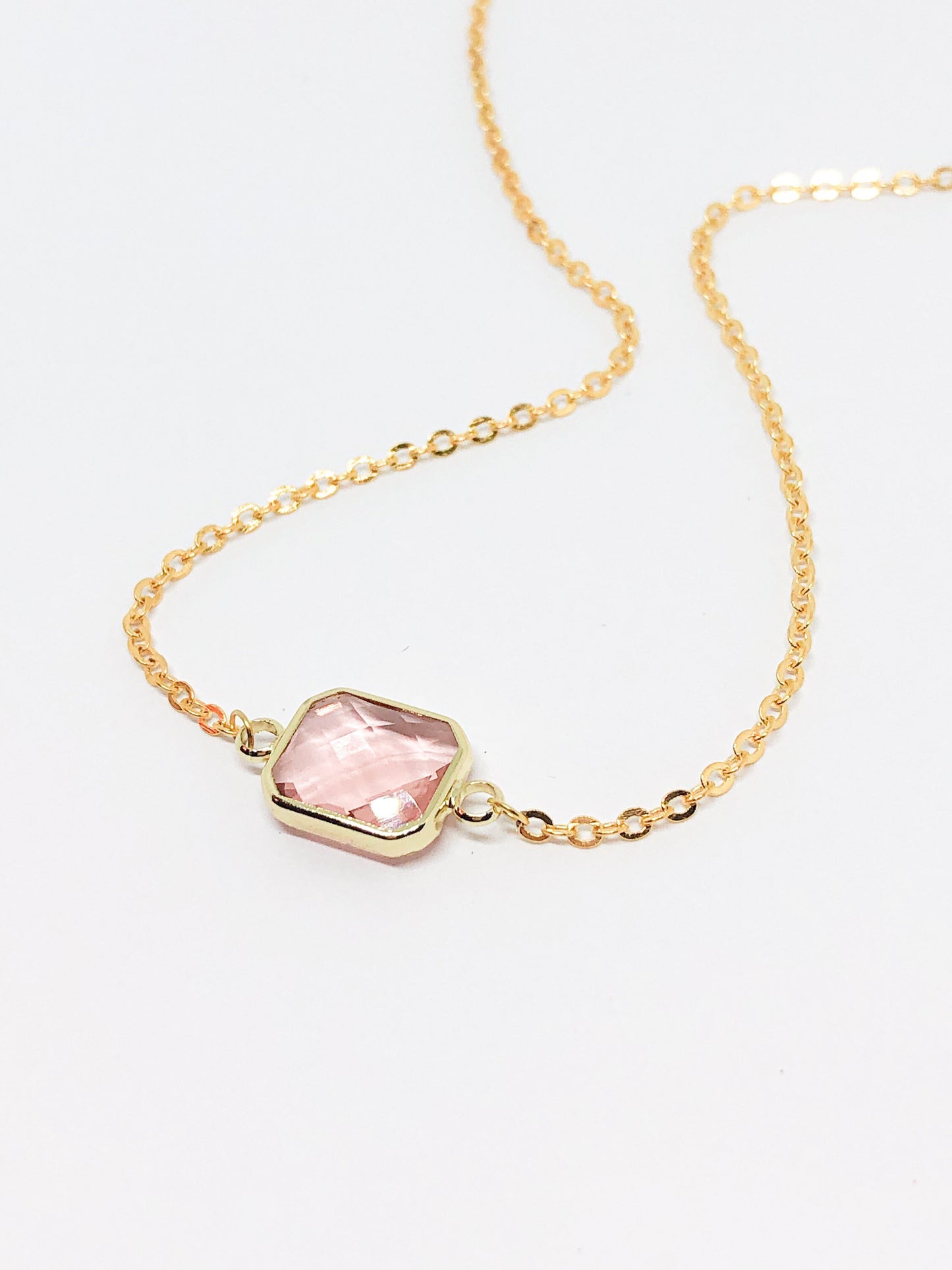 Pink glass charm necklace