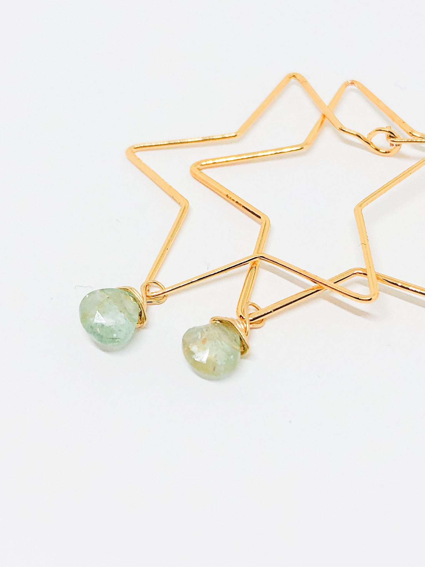 Gold star hoop earrings with aquamarine teardrop