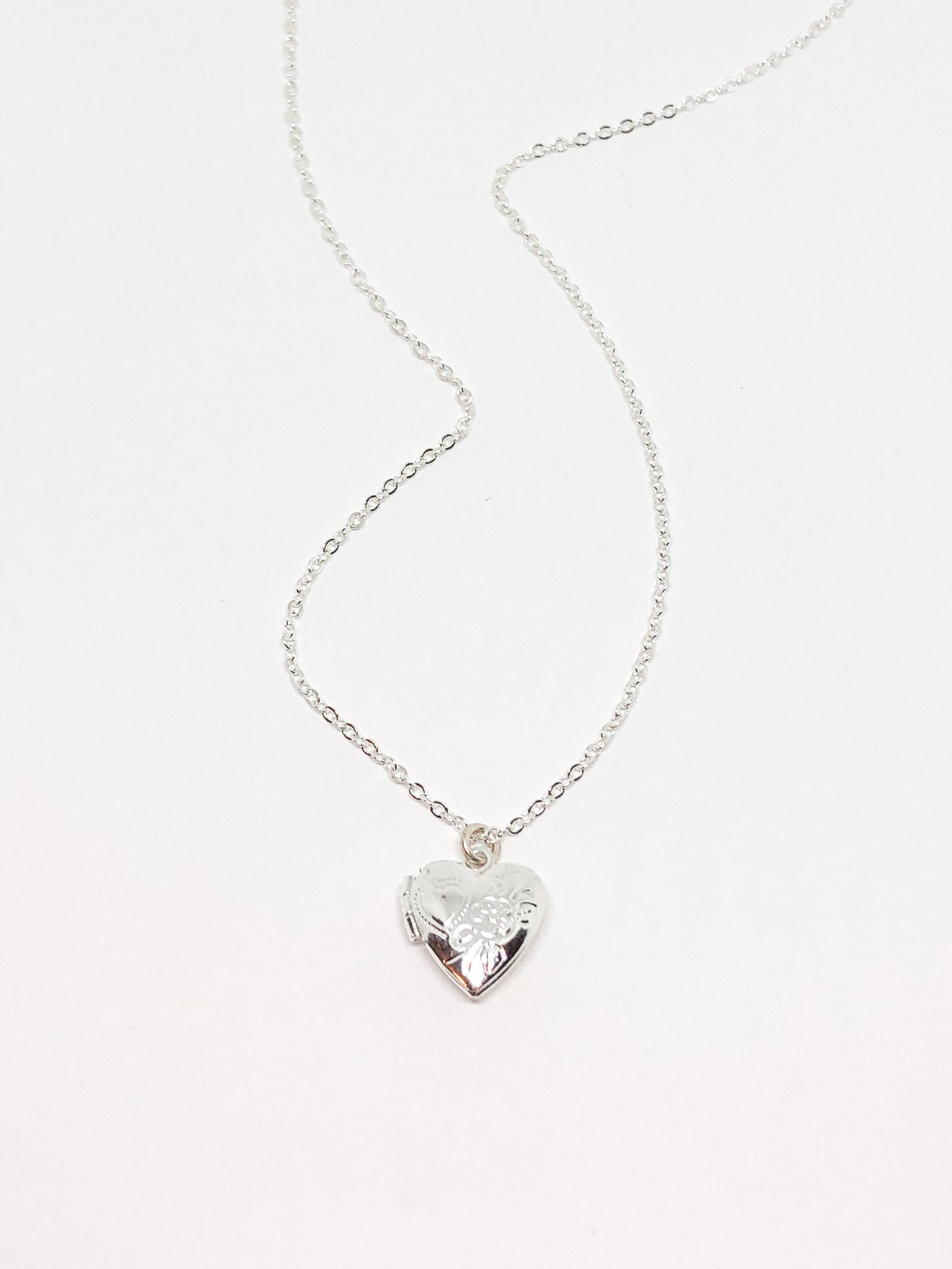 Small heart locket in gold or silver