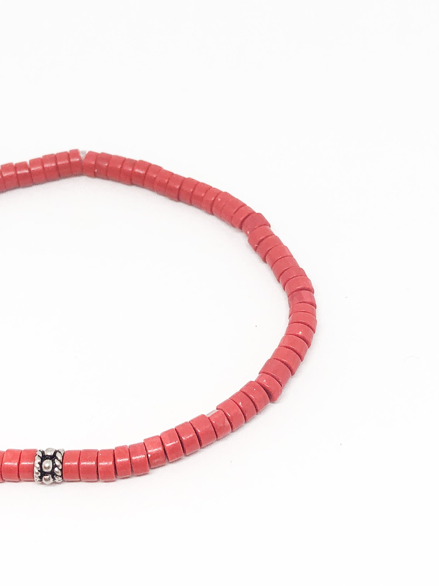 Coral beaded bracelet with silver accent