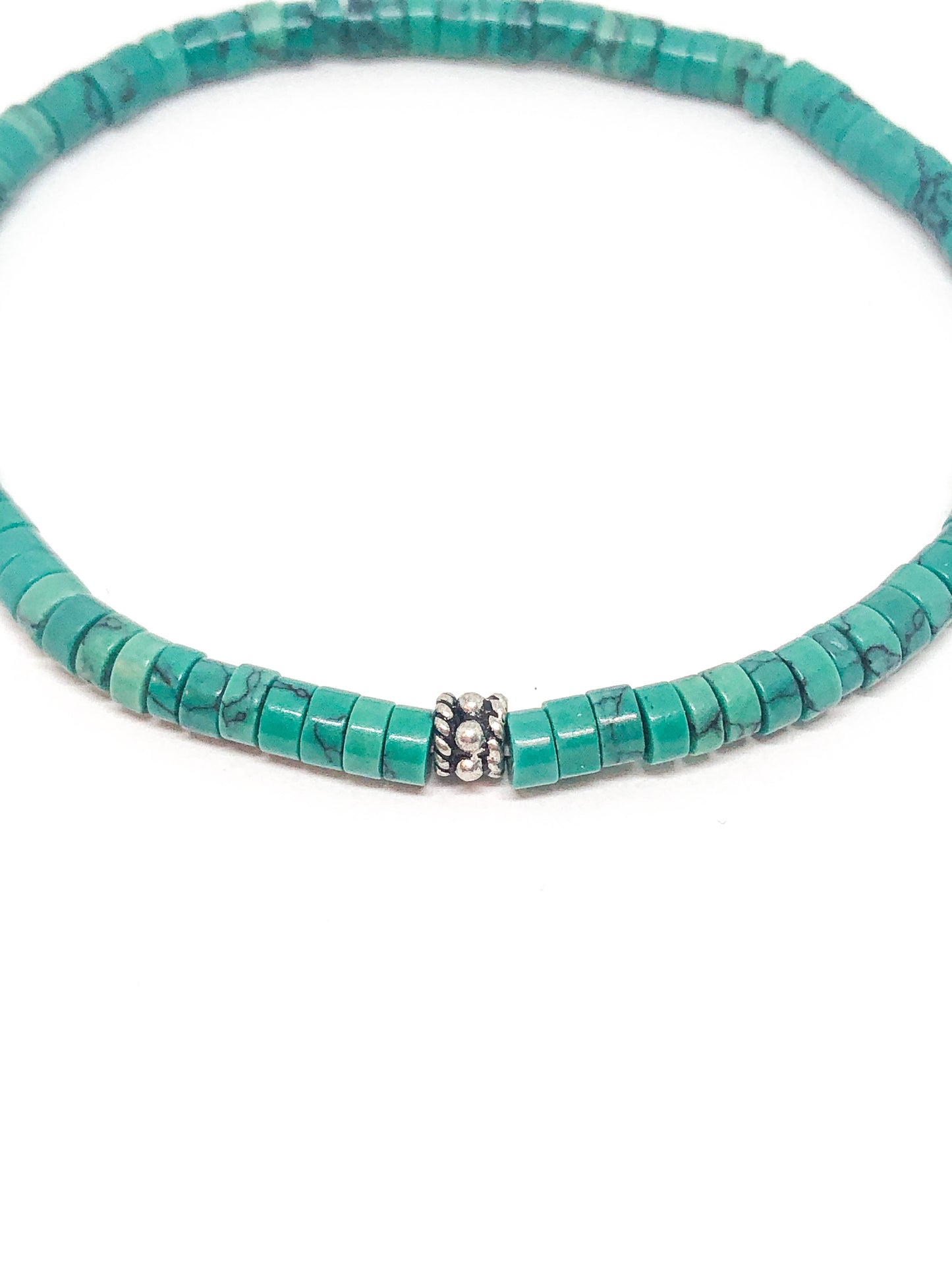 Malachite green beaded bracelet with silver accent