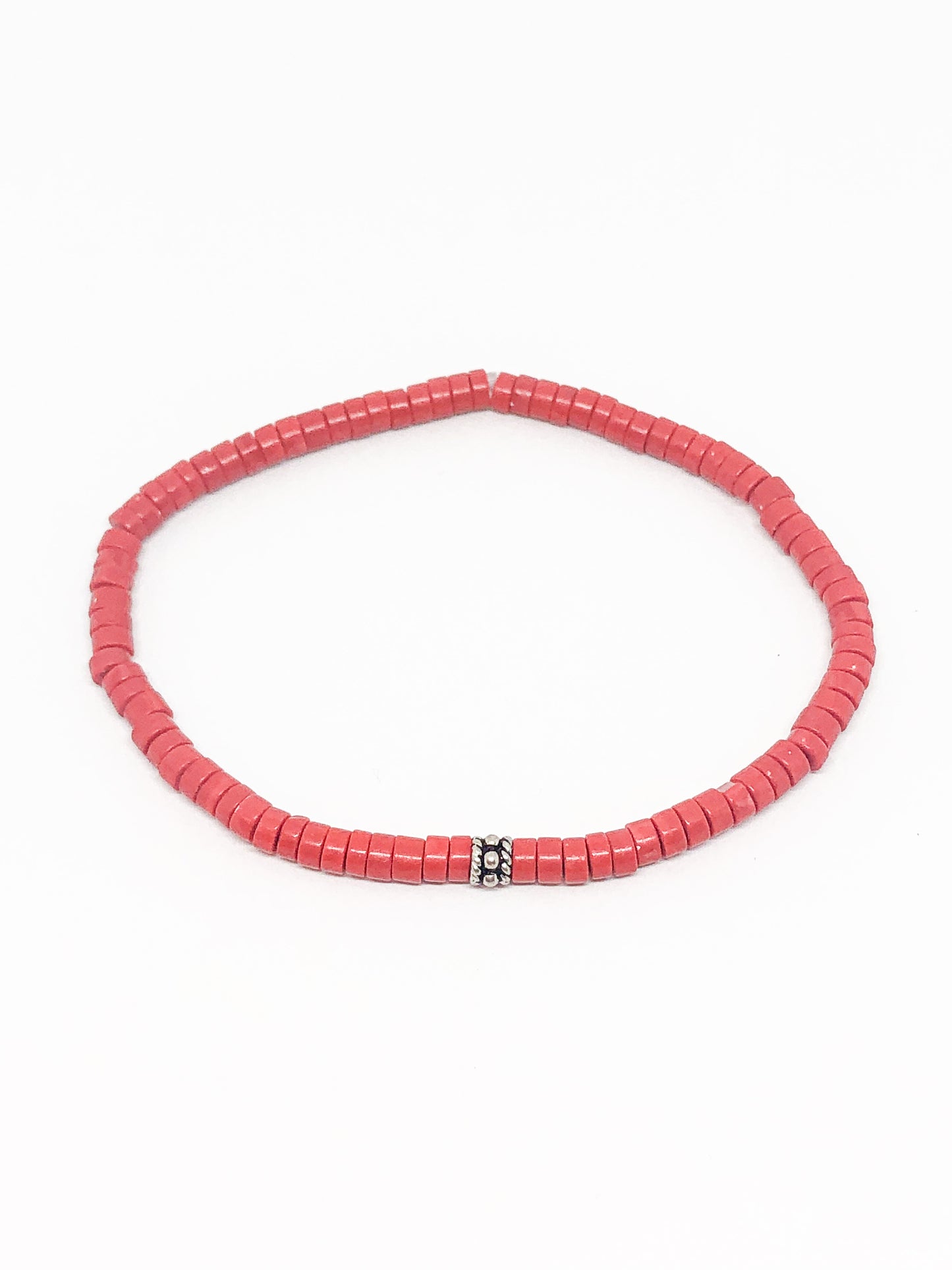 Coral beaded bracelet with silver accent