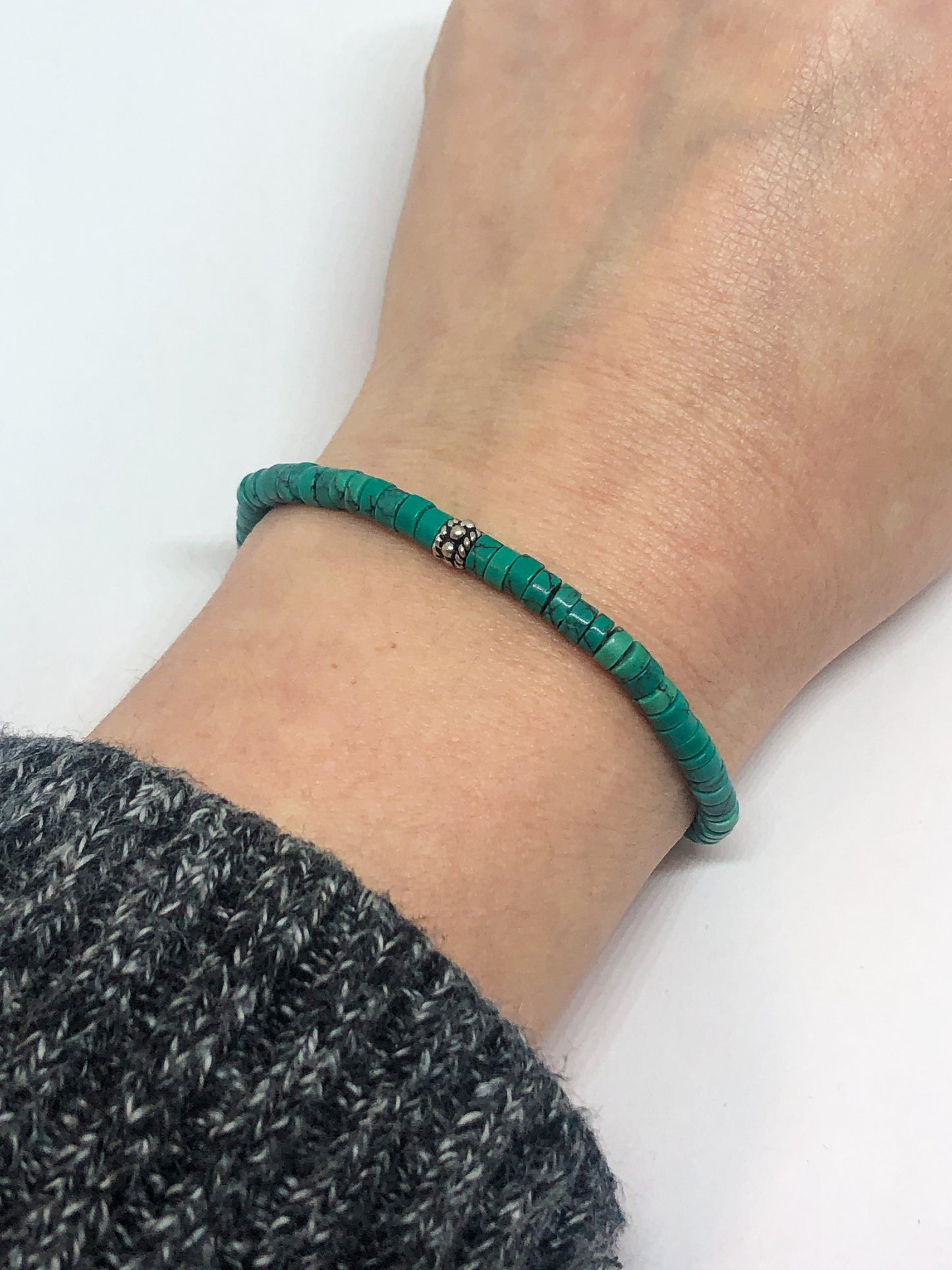 Malachite green beaded bracelet with silver accent