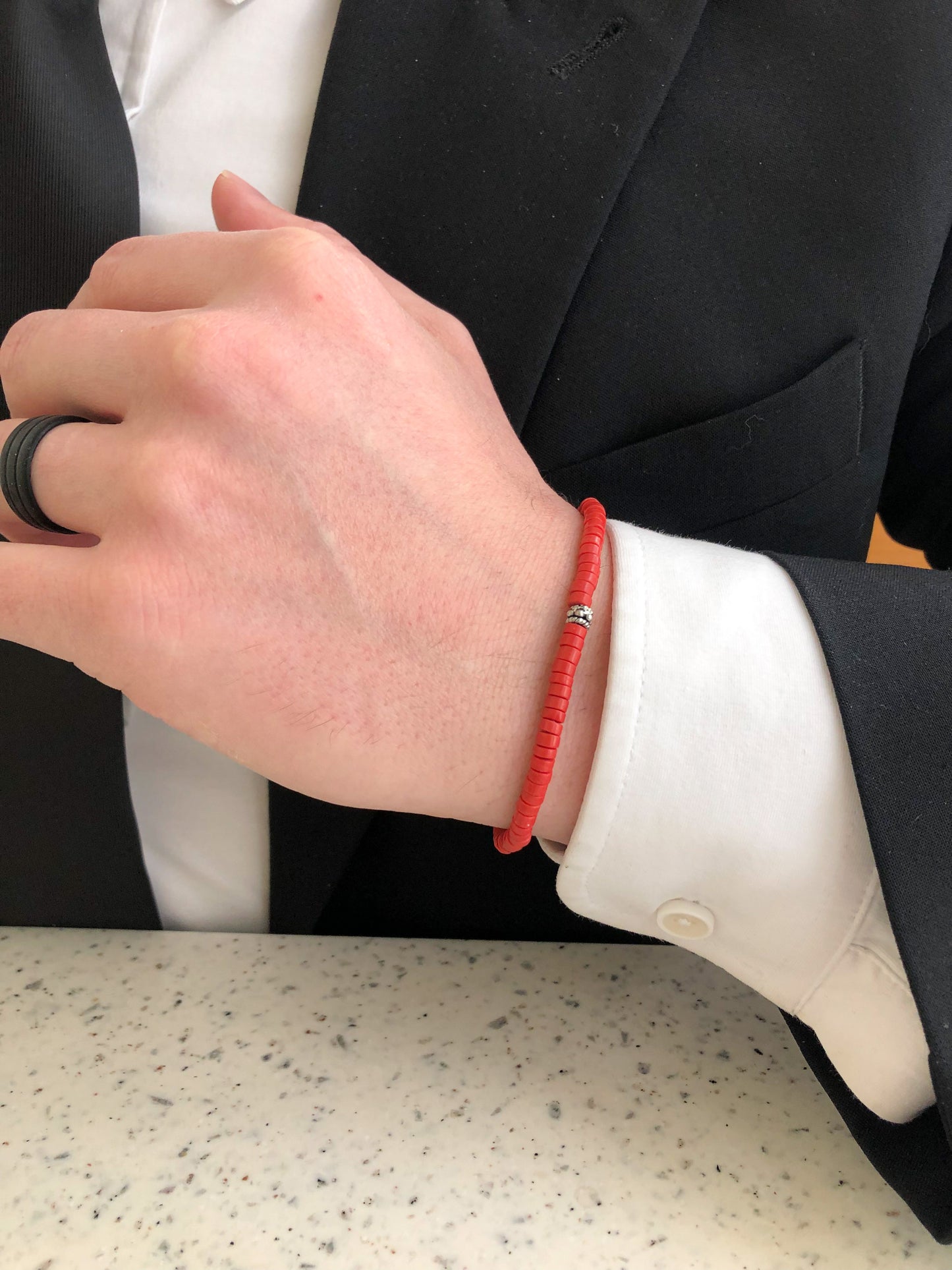Coral beaded bracelet with silver accent