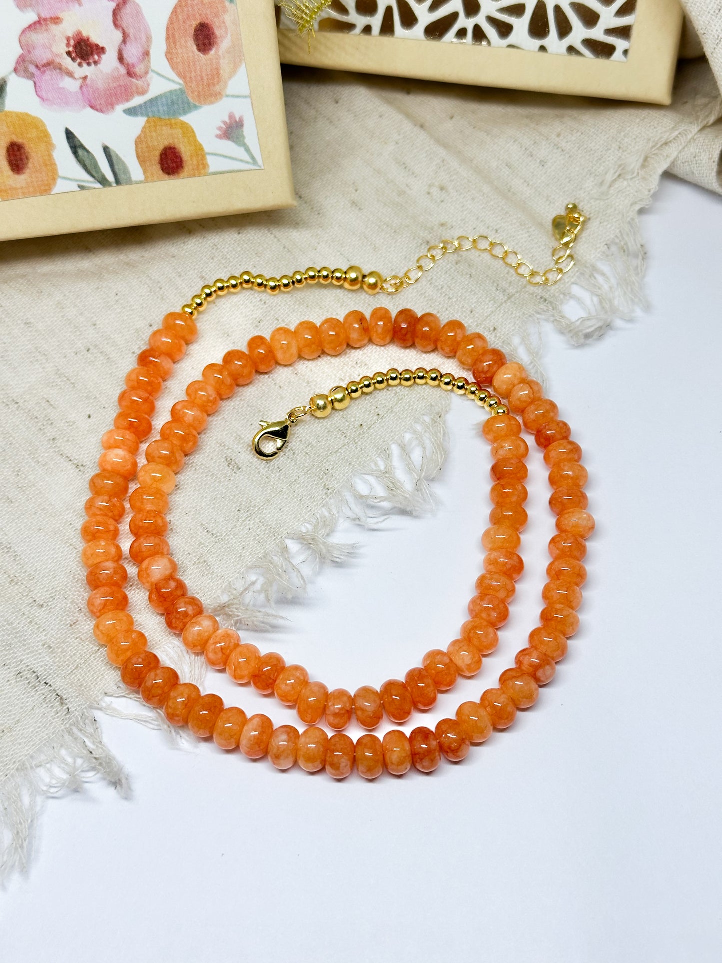 Bright orange gemstone necklace