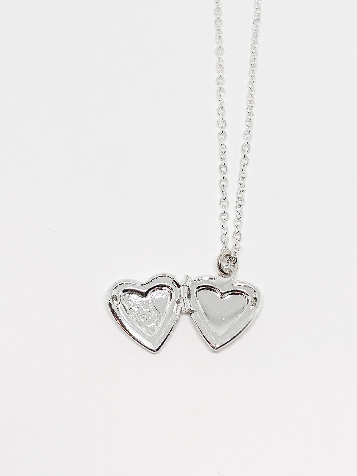 Small heart locket in gold or silver