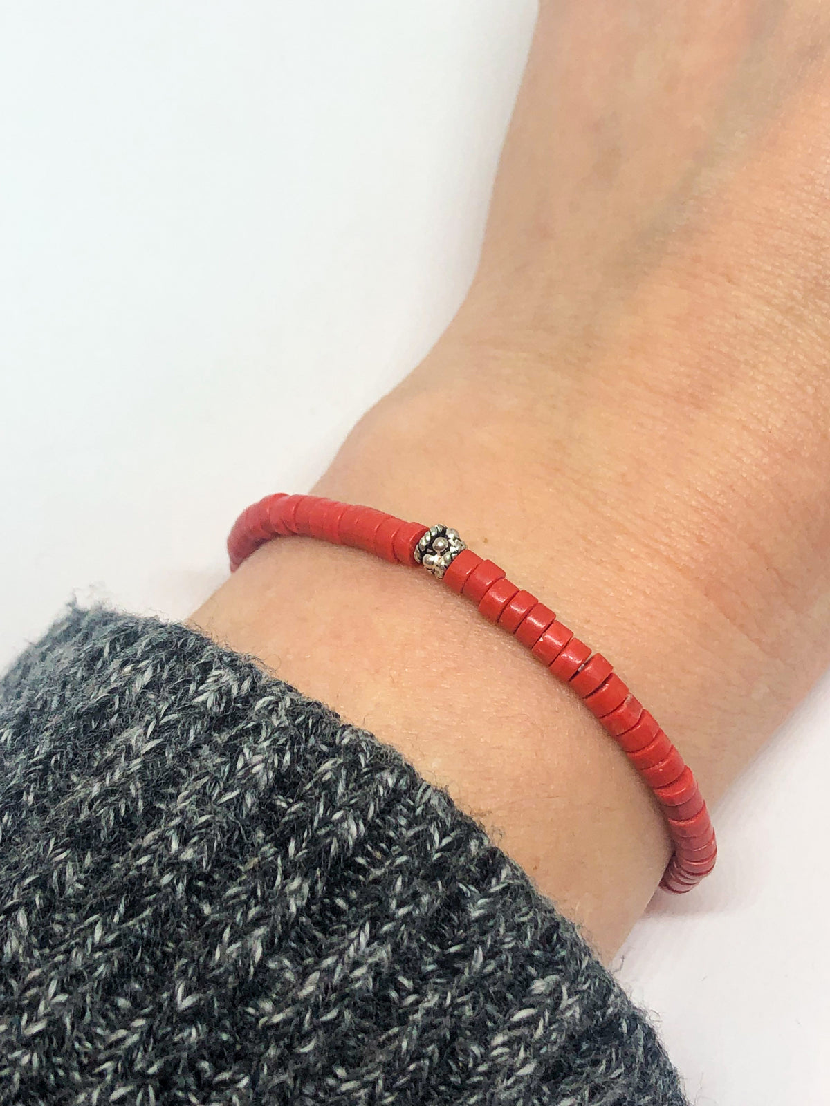 Coral beaded bracelet with silver accent
