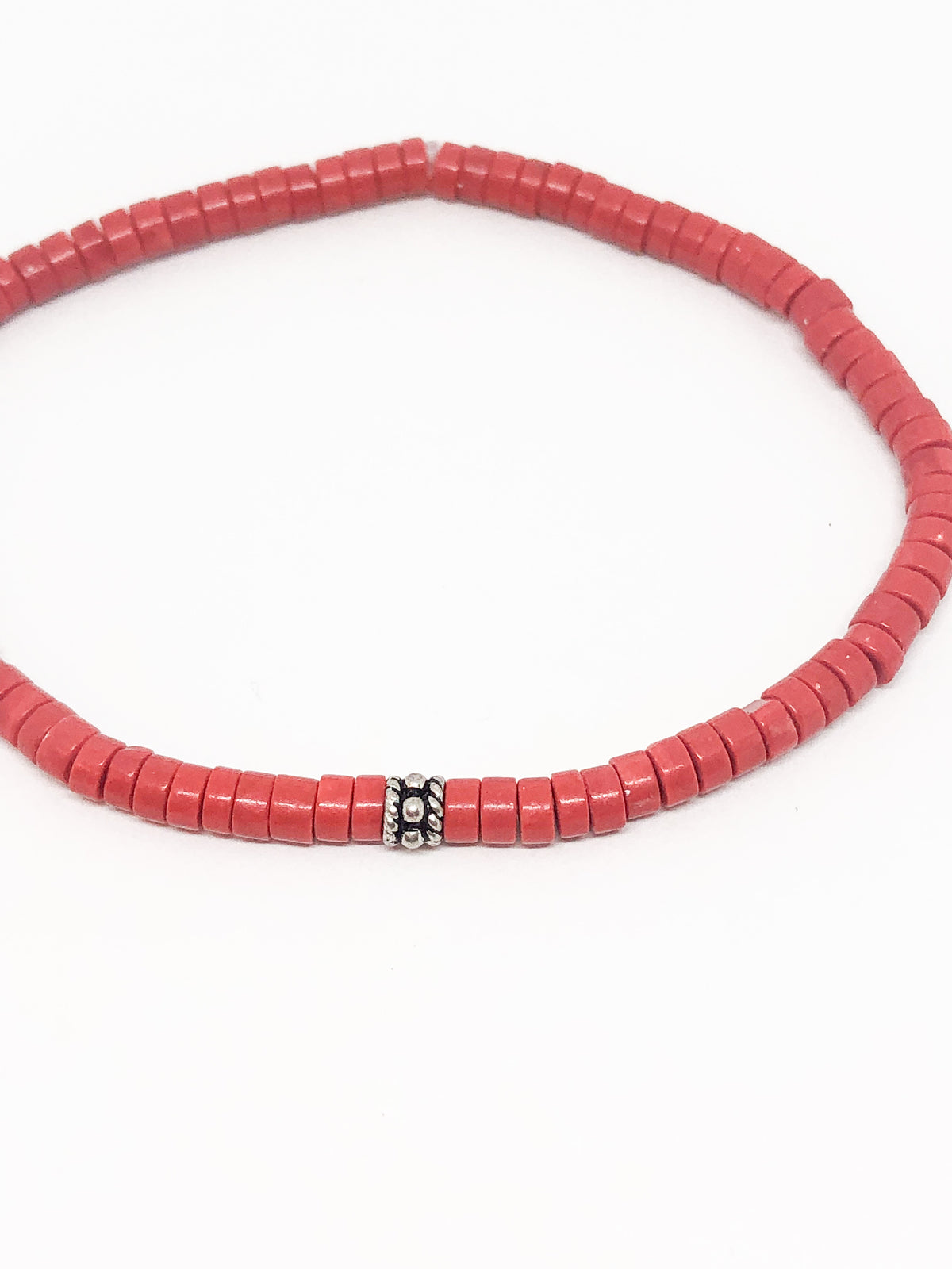 Coral beaded bracelet with silver accent