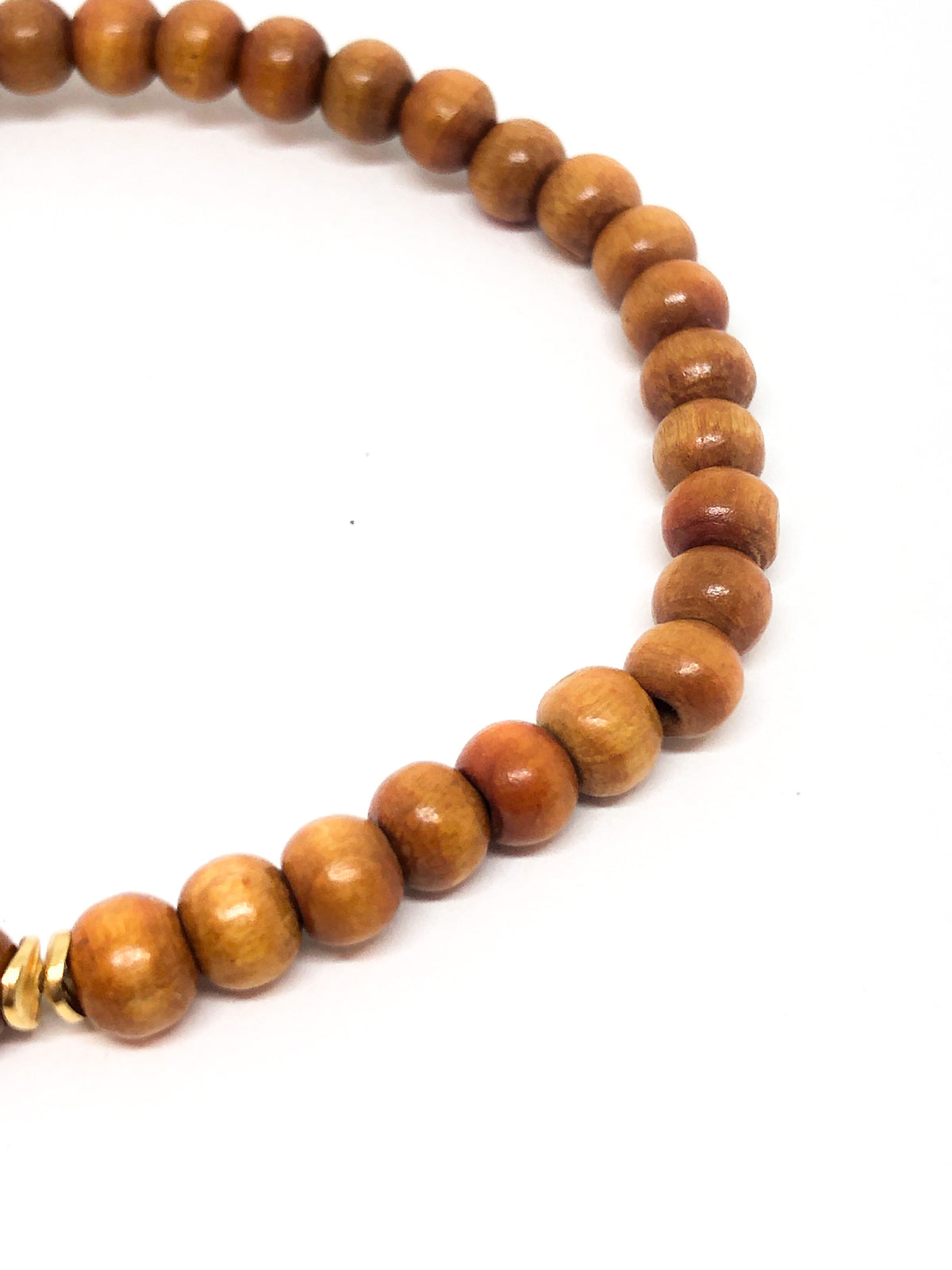 Wooden beaded bracelet with gold accent